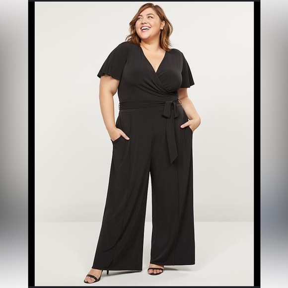 LANE BRYANT Stretchy, Wide Leg, Flutter Sleeve, Faux Wrap Jumpsuit - Picture 5 of 13
